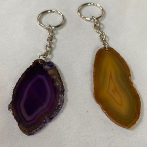 Two polished agate key rings